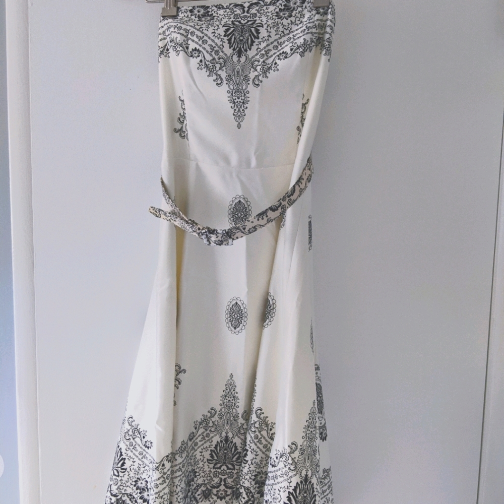 Belted strapless black and white silk like dress